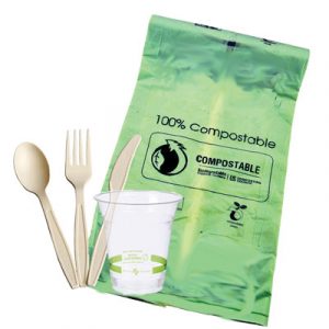 A green compostable bag and bio-degradable utensils and cup, non of which are accepted in MSS compostables carts
